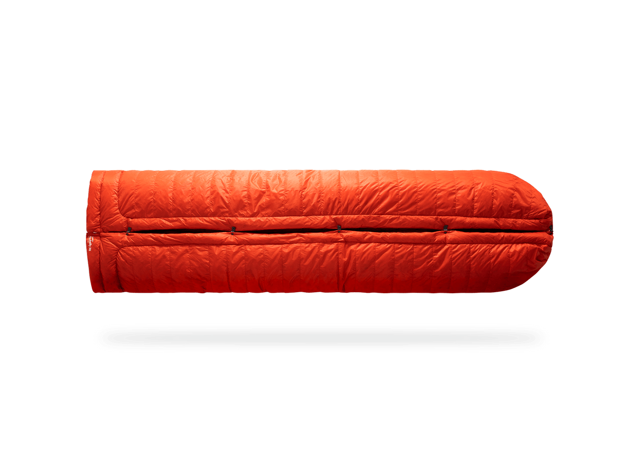 Studio Image of Kammok Trail Quilt Firebelly 30°F in Sleeping Bag Mode.