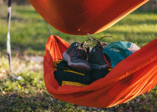 Shoes & Gear stacked in Kammok Storage Joey Gear Sling