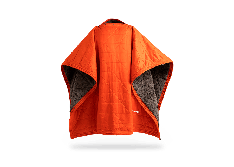 Studio image of a Kammok Blanket Mountain Blanket in Poncho Mode.