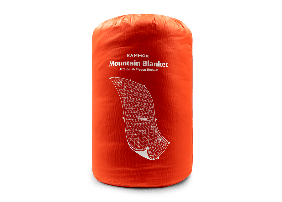 Studio Image of a Kammok Blanket Mountain Blanket in storage bag.