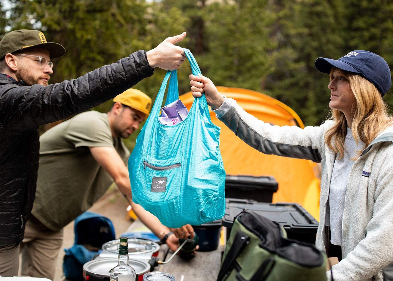 Campers unloading groceries from Kammok Bag Tote